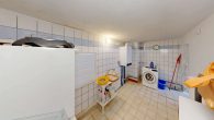 Waschkueche - Behagliches Einfamilienhaus mit Balkon, Kamin & Nebengebäude – perfekt für ruhiges, zentrales Wohnen