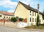 Mehrfamilienhaus mit 6 Wohneinheiten und geschlossenem Innenhof in Wolmirsleben - Hausansicht Straßenseite