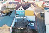 Mehrfamilienhaus mit 2 Gewerbeeinheiten im Herzen vom Kurort Bad Salzelmen - Luftbild aus Westen