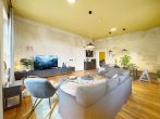Wohnzimmer aus Sitzecke - Design trifft Natur – Ferienwohnung am Kanal für bis zu 8 Personen (115m2) in Schönebeck