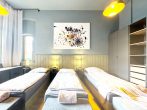 Schlafzimmer1_Betten - Design trifft Natur – Ferienwohnung am Kanal für bis zu 8 Personen (115m2) in Schönebeck
