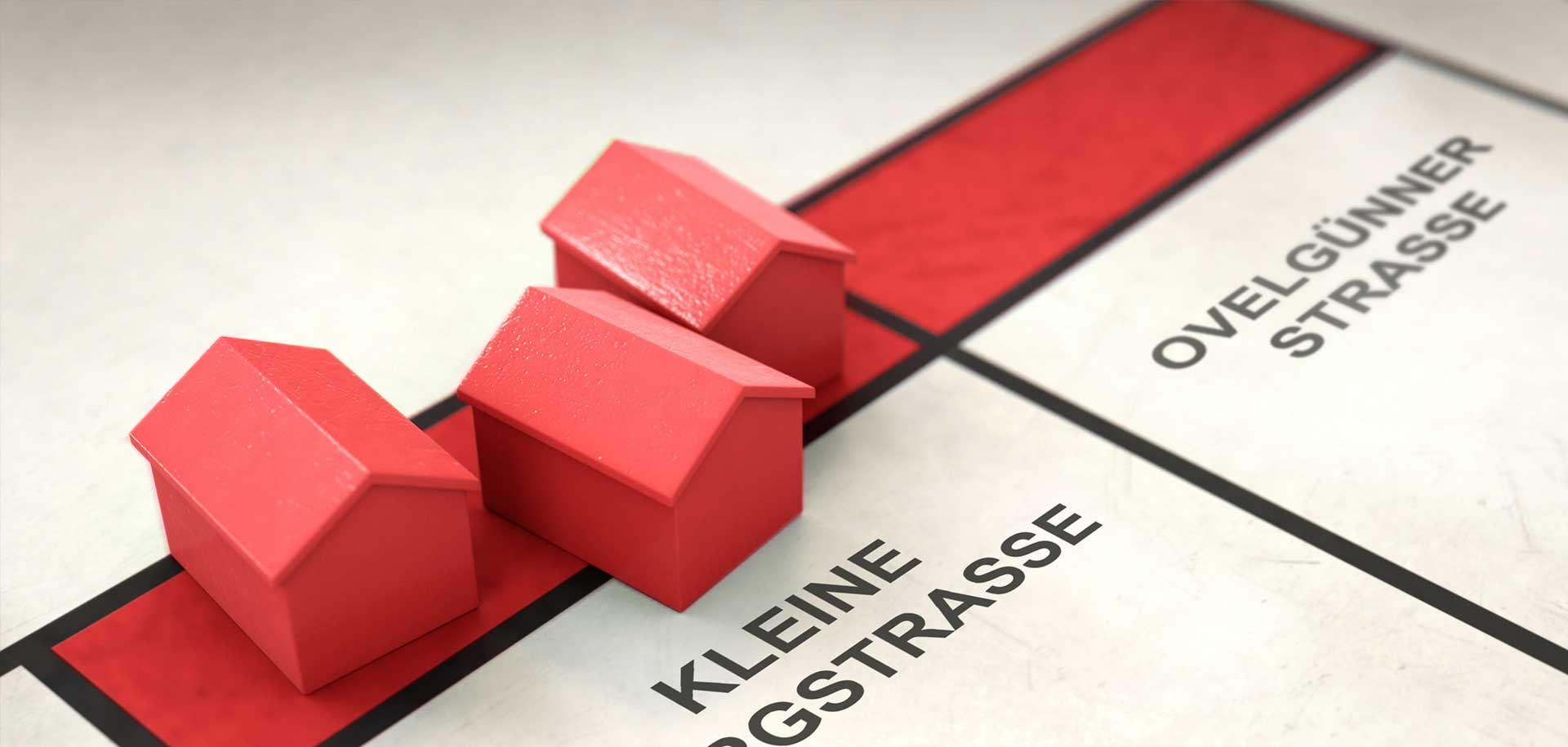 Rote Spielhäuser auf einem Straßenplan von Schönebeck